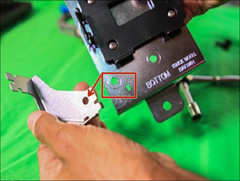 03c_-_secure_buzzer_bracket_to_mounting.png